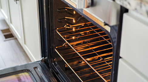Techman Appliance Repair technician diagnostic for an oven heating up after same-day stove and oven repair in Ottawa, Kanata, and Nepean.