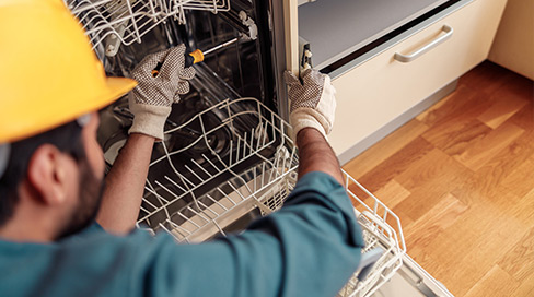 Running diagnostic test cycle on newly installed dishwasher in Aurora